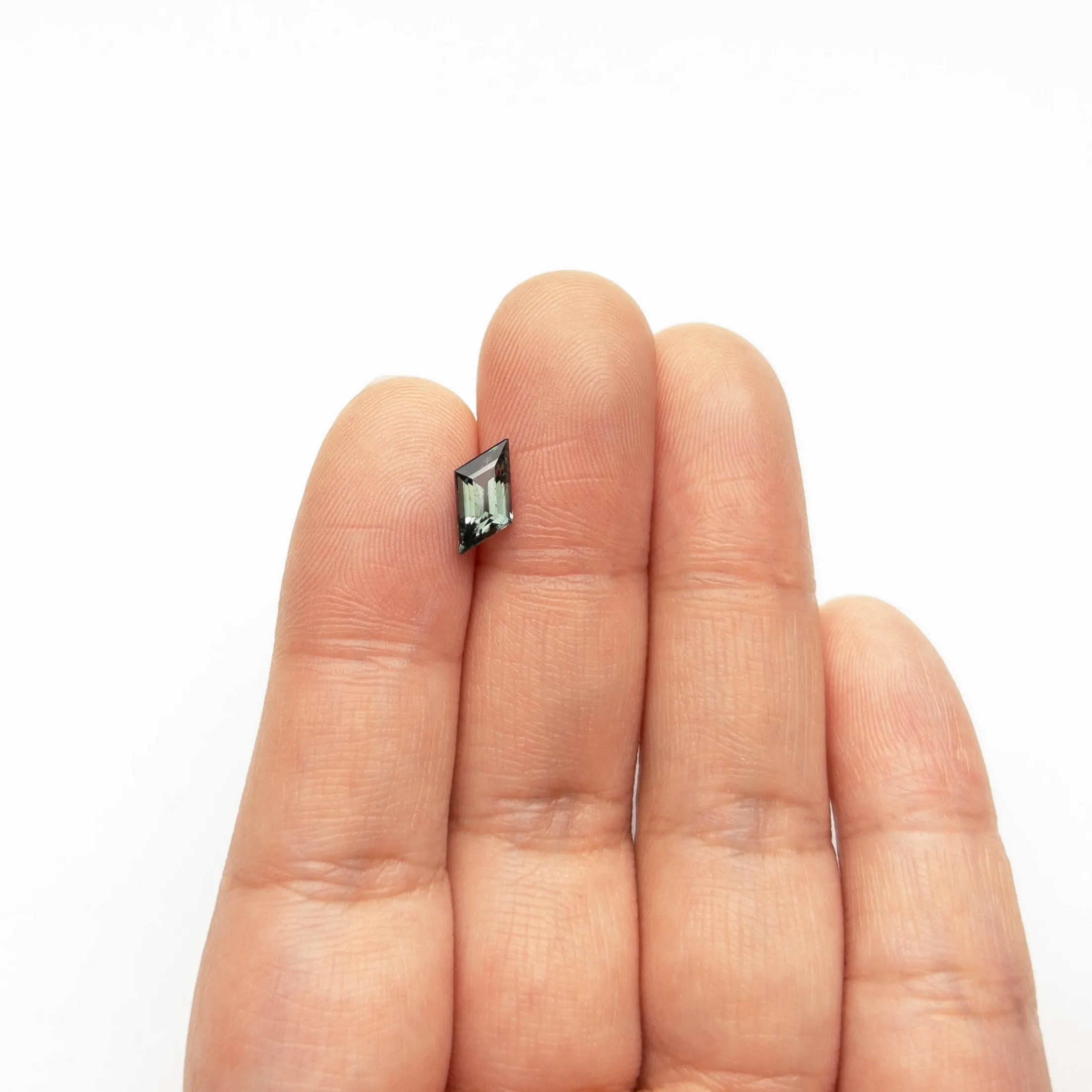 1.24ct 10.35x6.38x3.56mm Geometric Step Cut Sapphire 23060-01